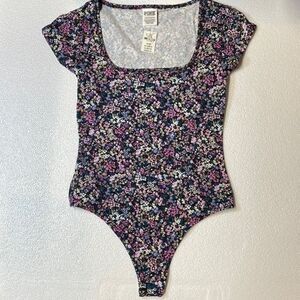 Victoria’s Secret Pink woman’s bodysuit. Size XS
